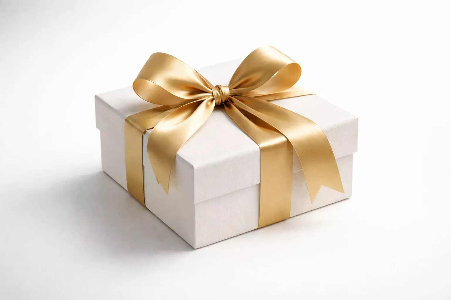 Elegante Geschenkbox mit goldenem Band als Symbol für Bonus